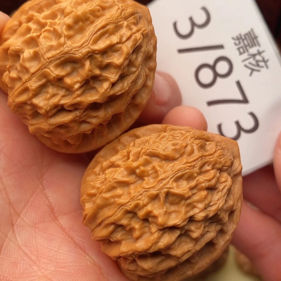 文玩核桃把件38金牛