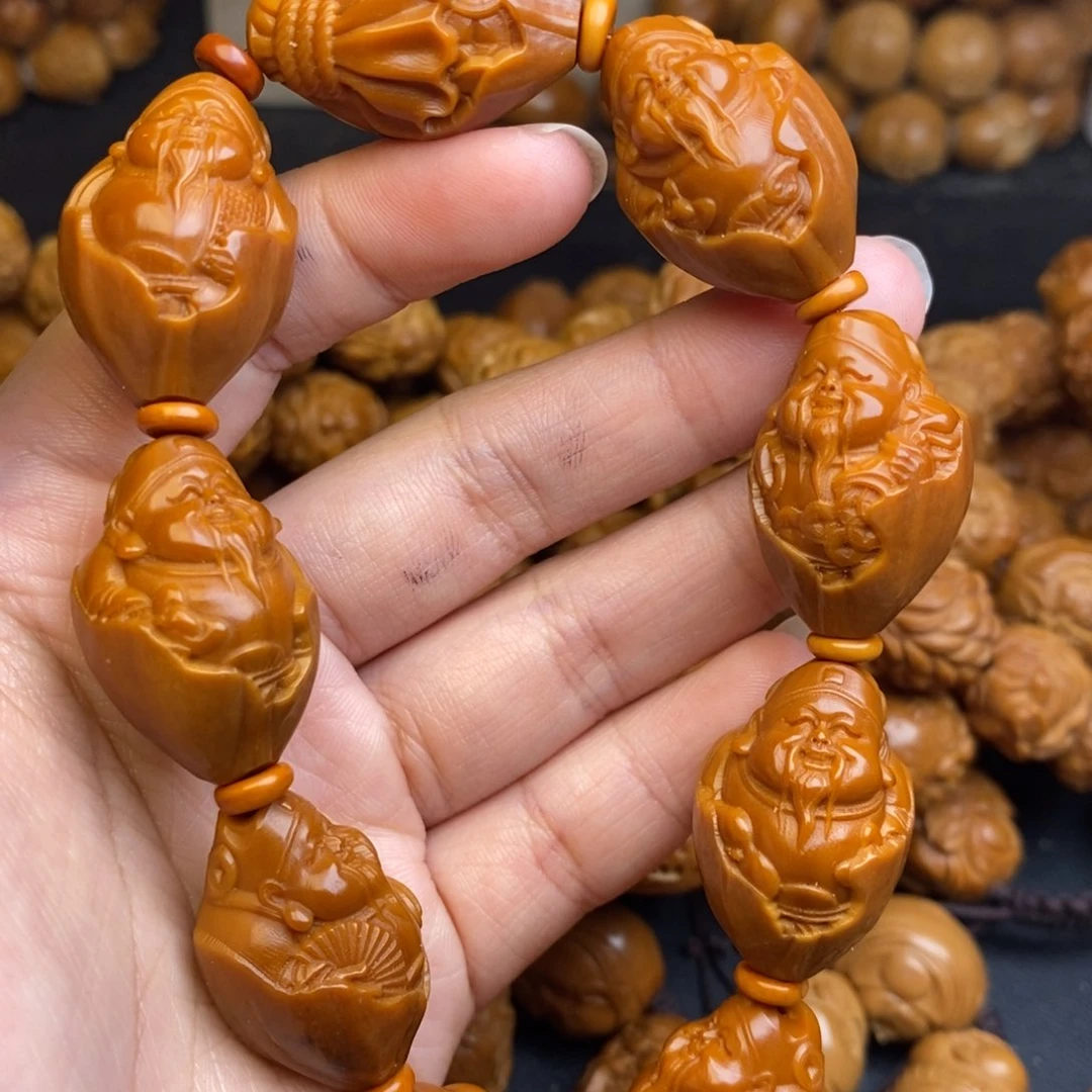 橄榄核吊坠包衣财神1.7