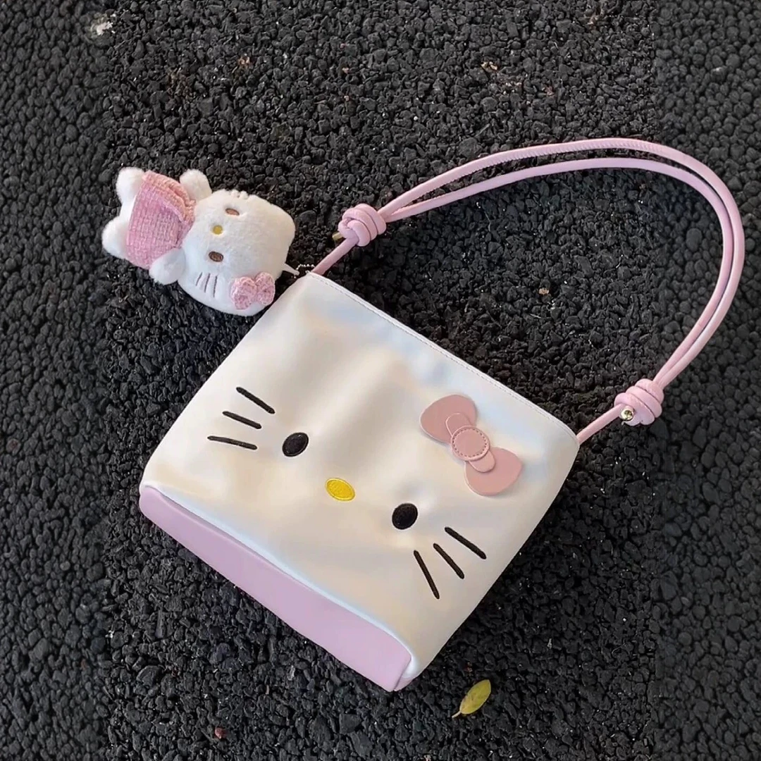 可爱小猫手提单肩斜挎水桶包女式2025新款小众时尚休闲简约腋下包