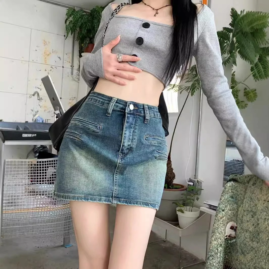 701-750牛仔短裙显瘦高腰时尚夏季不规则包臀百搭设计感A字开叉