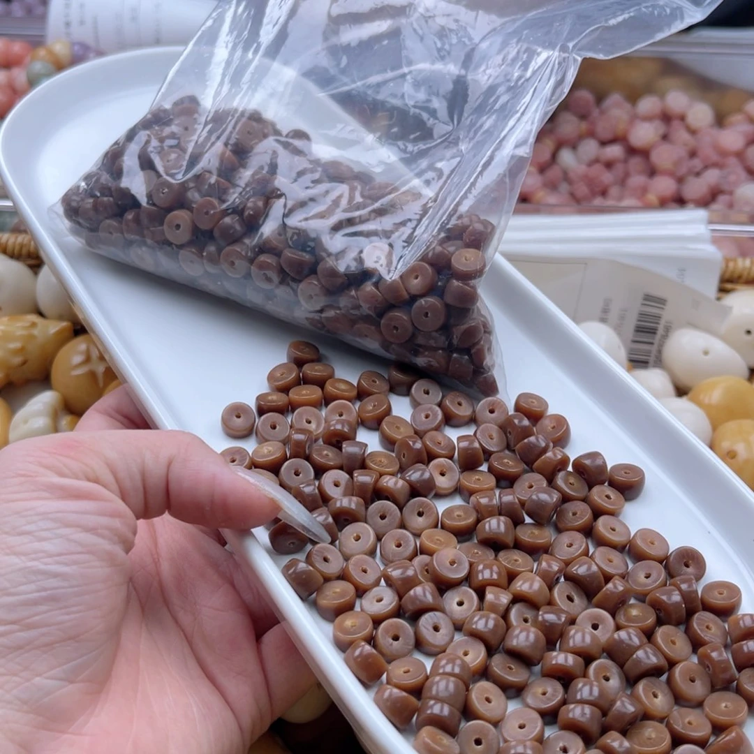 白玉菩提吊坠q9mm/100+10颗巧克力小肠