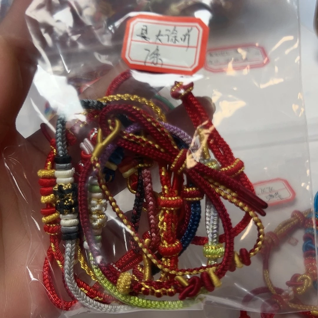 是***吖无纺布手工编织红绳混搭