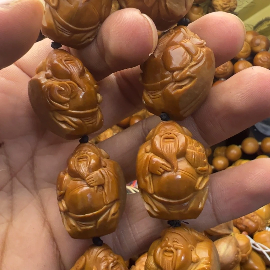 飓***风吊坠橄榄核铁盒包衣财神