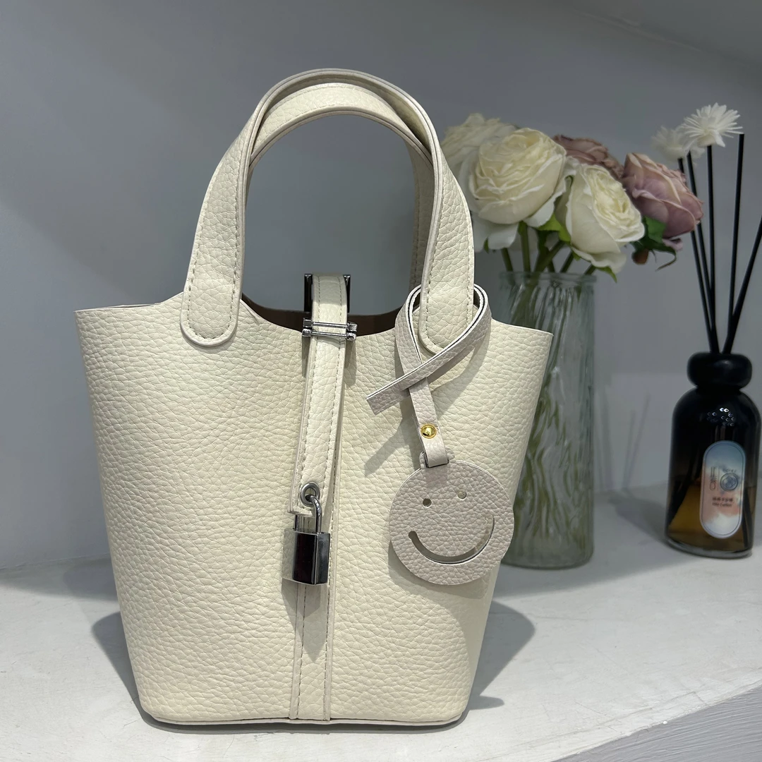 新款斜挎包大容量包包百搭ins荔枝纹扣式水桶包小众单肩斜挎女包