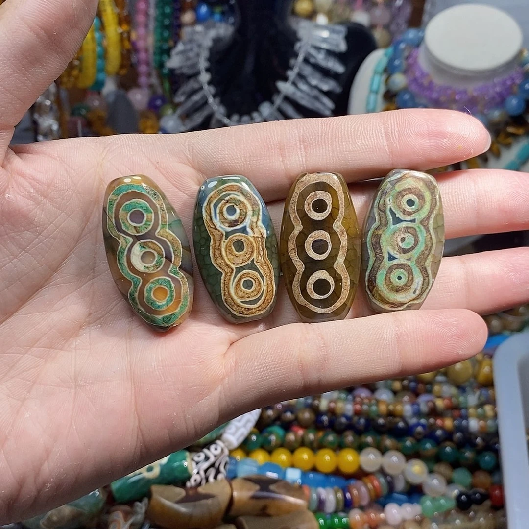 石英质玉未镶嵌，4颗藏传六眼风化老天珠21×38mm，