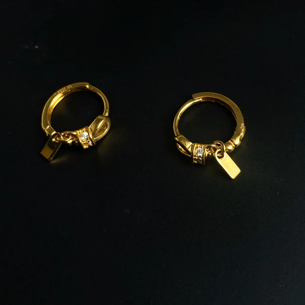 925银耳饰 小马蹄灵动丝带银条流苏精致耳扣耳环05242001/250033