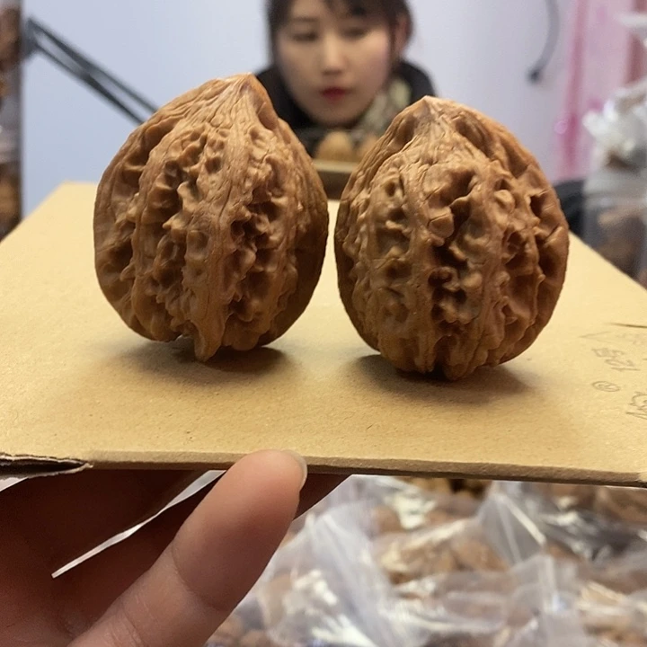 文玩核桃把件44红皮大古石小众