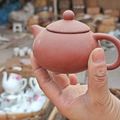 库存微瑕小紫砂壶一个