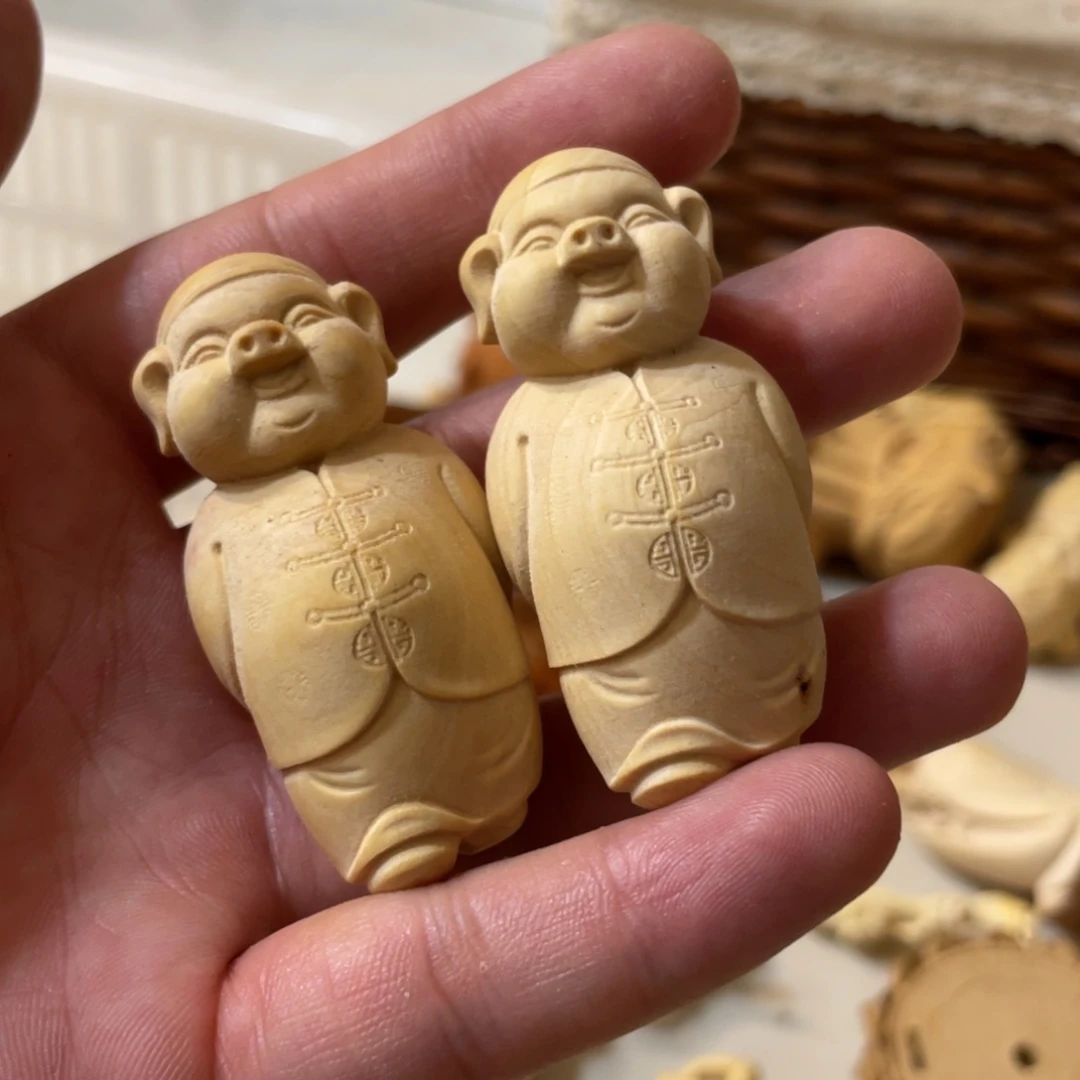 黄杨木小瑕疵猪一对
