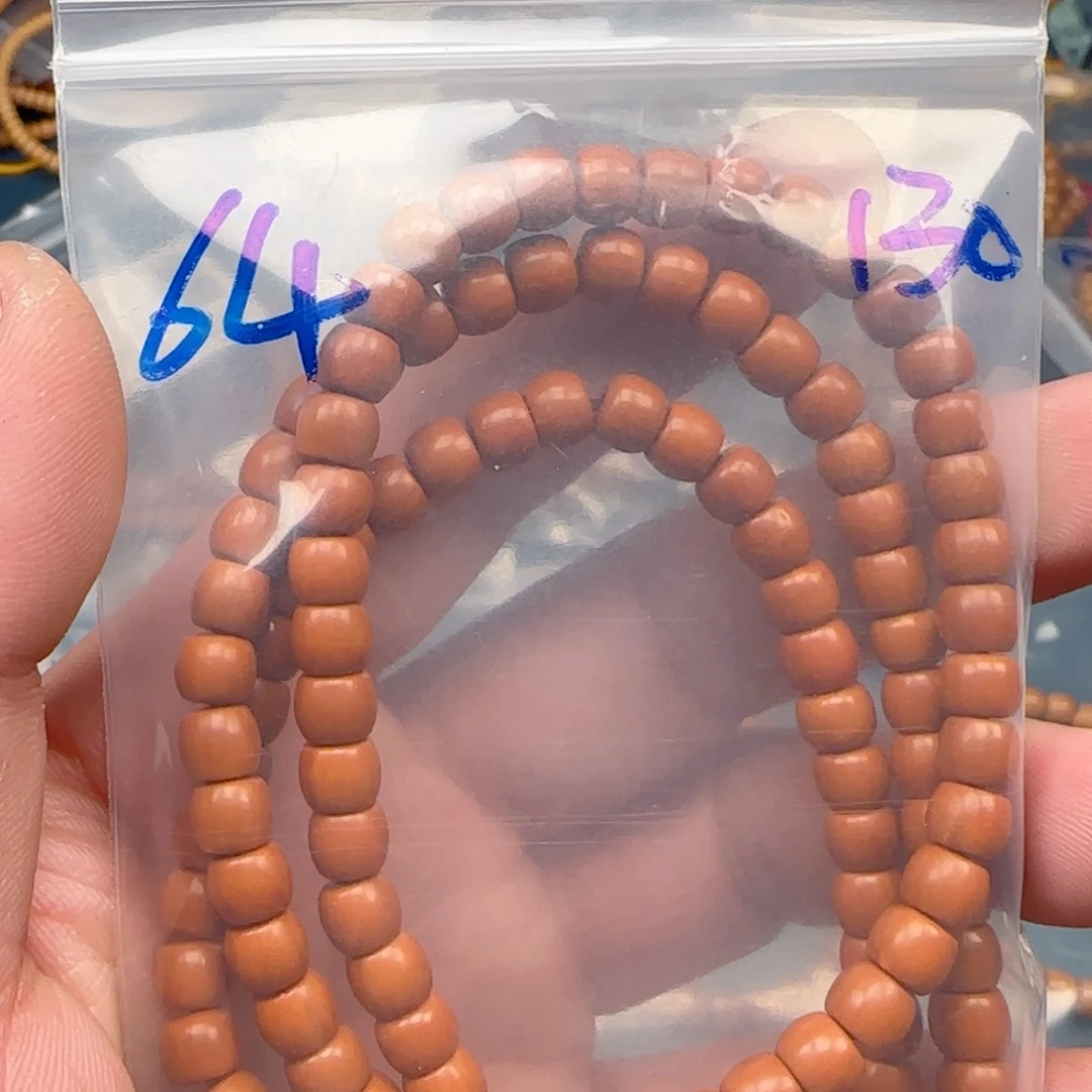 窝***家手串橄榄核老挝S+级核尖极限弧尺寸6.4