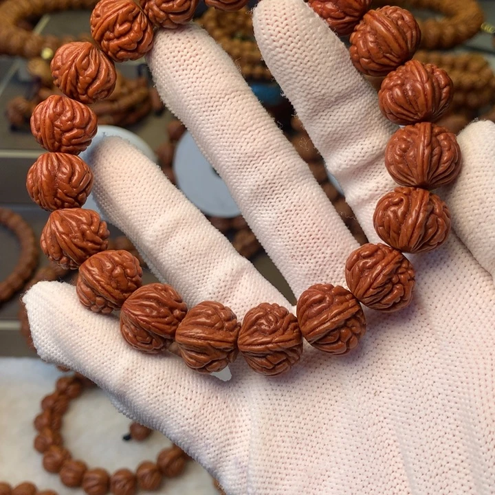 冷***。桃核手串秦岭龙纹