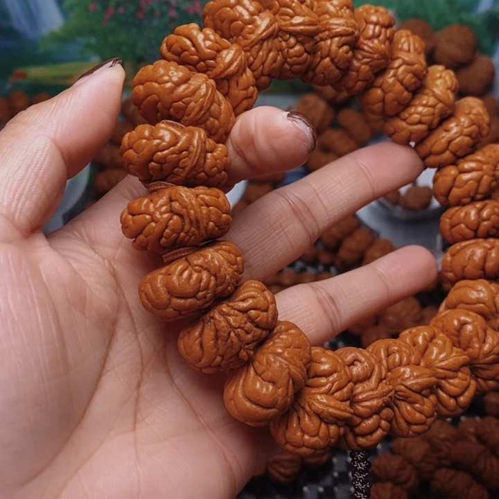 一***师文玩核桃吊坠龙纹桃核手串