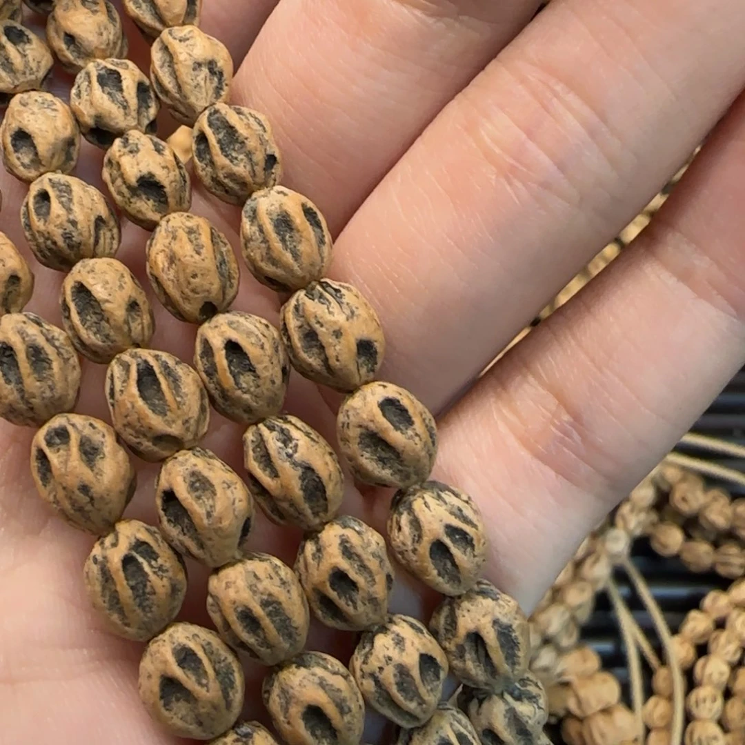 夕***萌柏香籽/百香籽吊坠