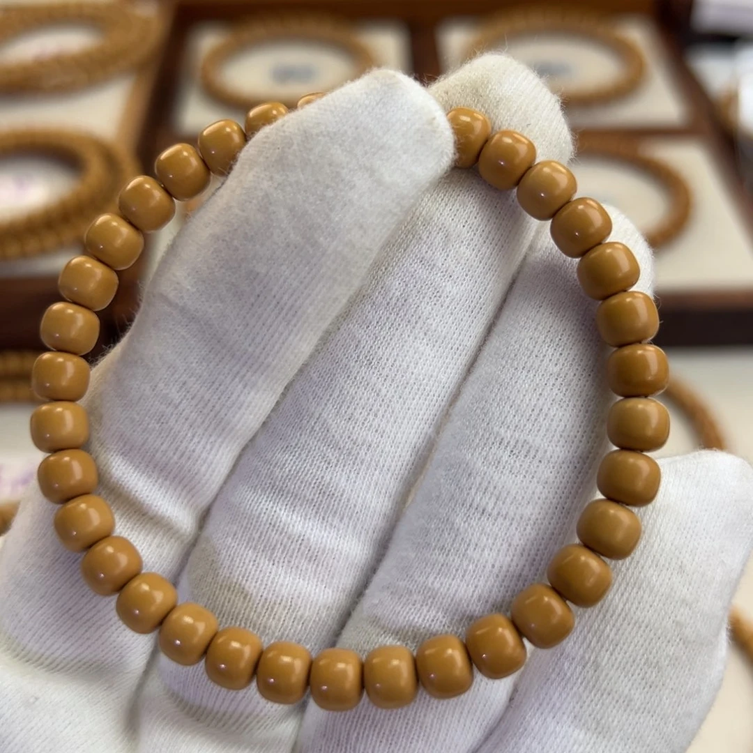 手串橄榄核6.4mm老挝老型单圈（微白）