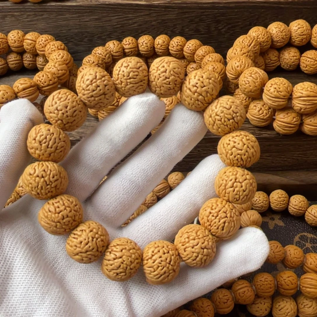 吊坠桃核笑**朝龙鳞苹