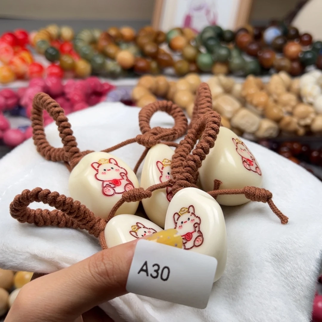 菩提根/象牙果吊坠A30牙果兔手把件30-40mm一串通货随机