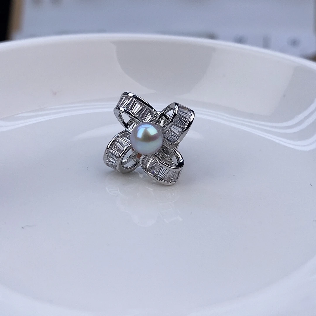 海水珍珠钛钢胸饰