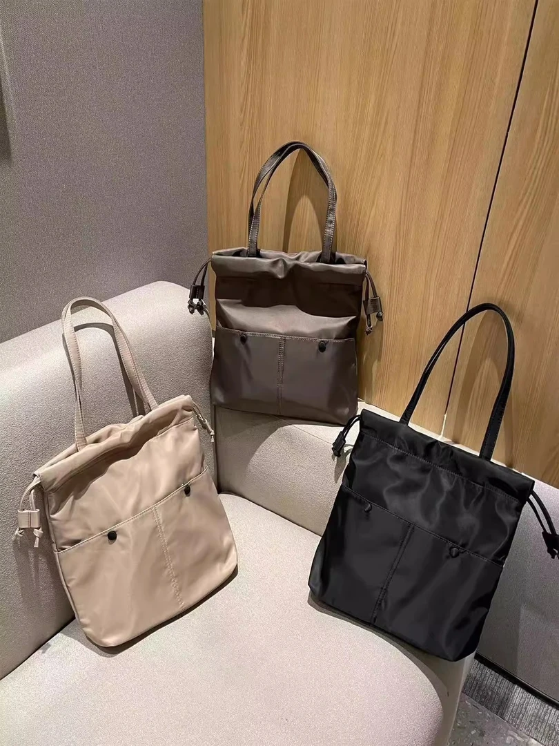 通勤包纯色简约大容量学生上课通勤轻便休闲时尚单肩斜挎托特包夏