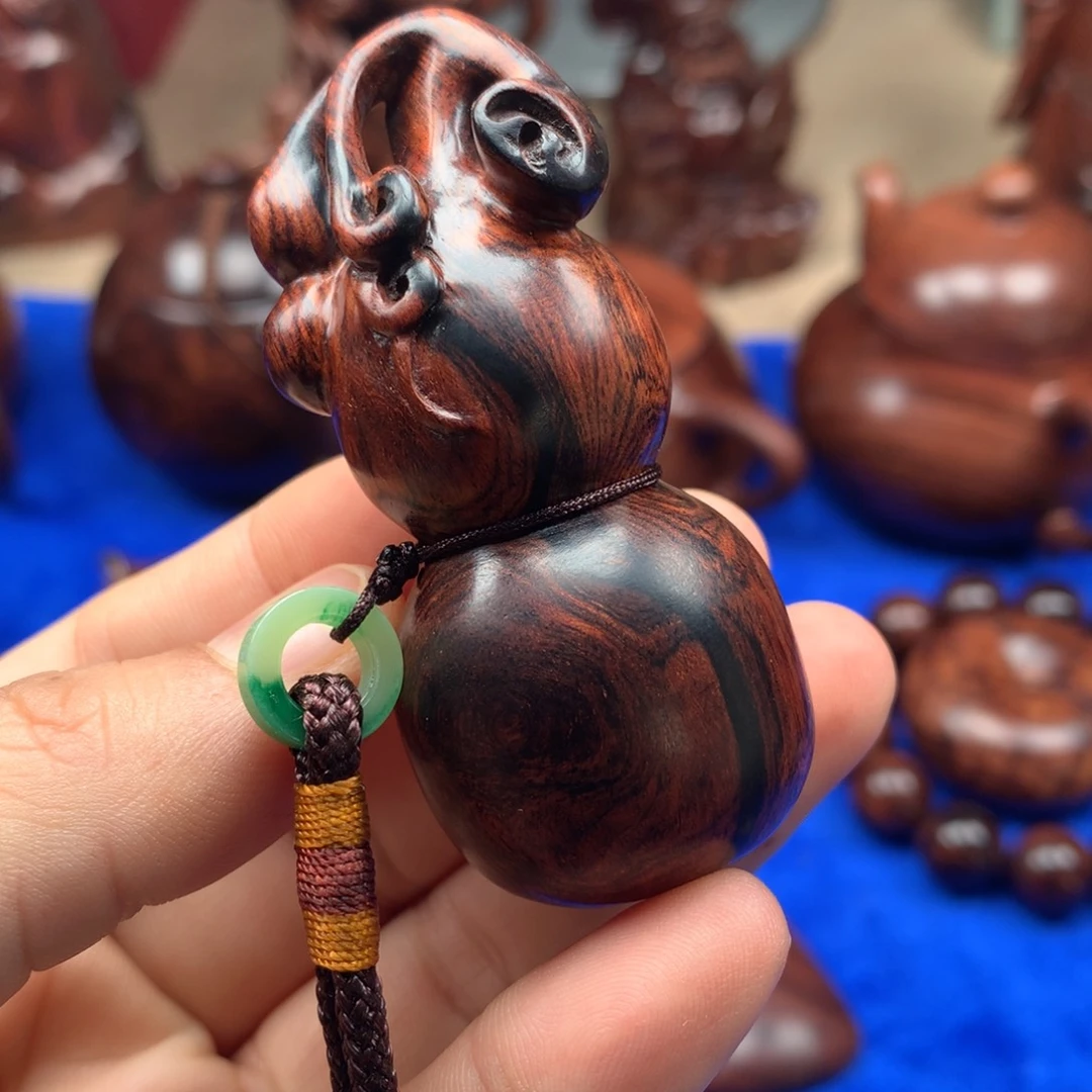 李***寒黄花梨/降香黄檀把件