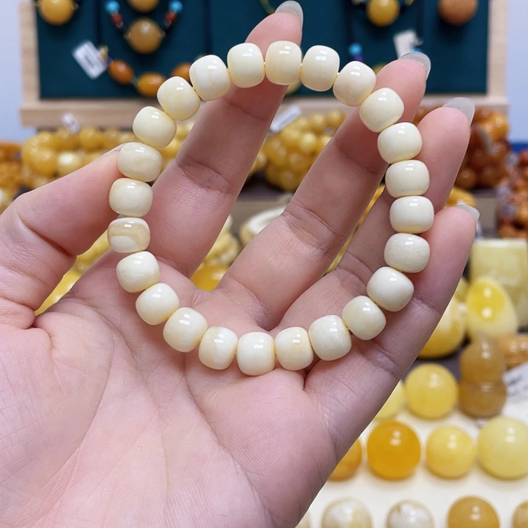 蜜蜡未镶嵌珠宝奇石牛9+mm单圈手串 瑕