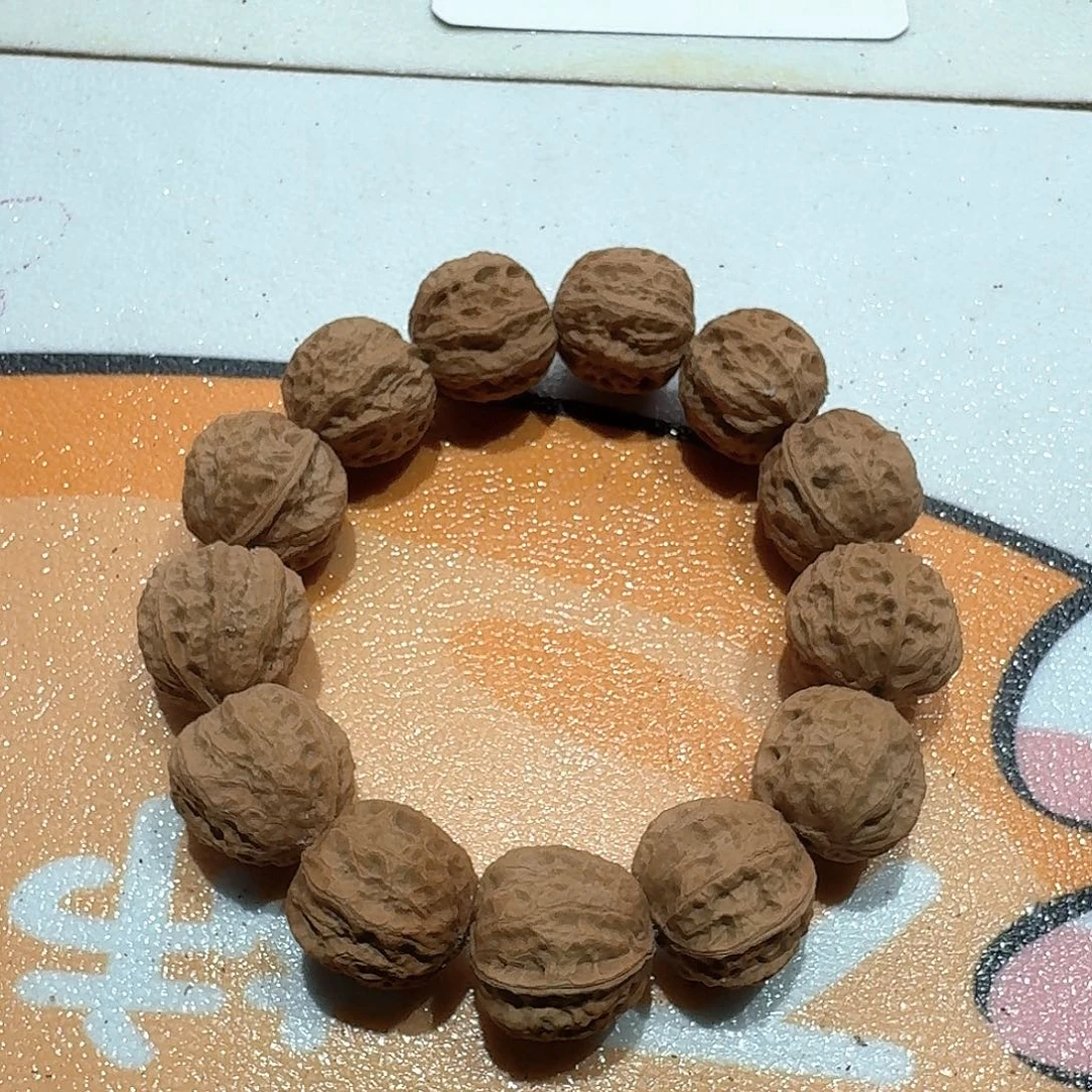 11号边24肚27高24的手串