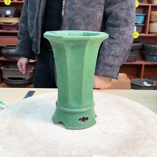 红陶司**酷紫砂花盆里有个叫