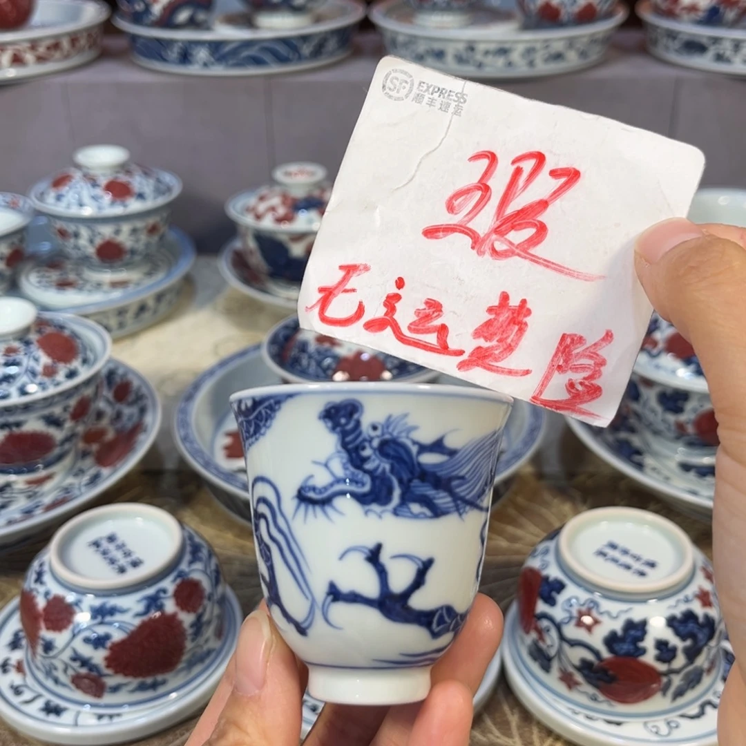 小***才青花仿元铠甲龙铃铛杯