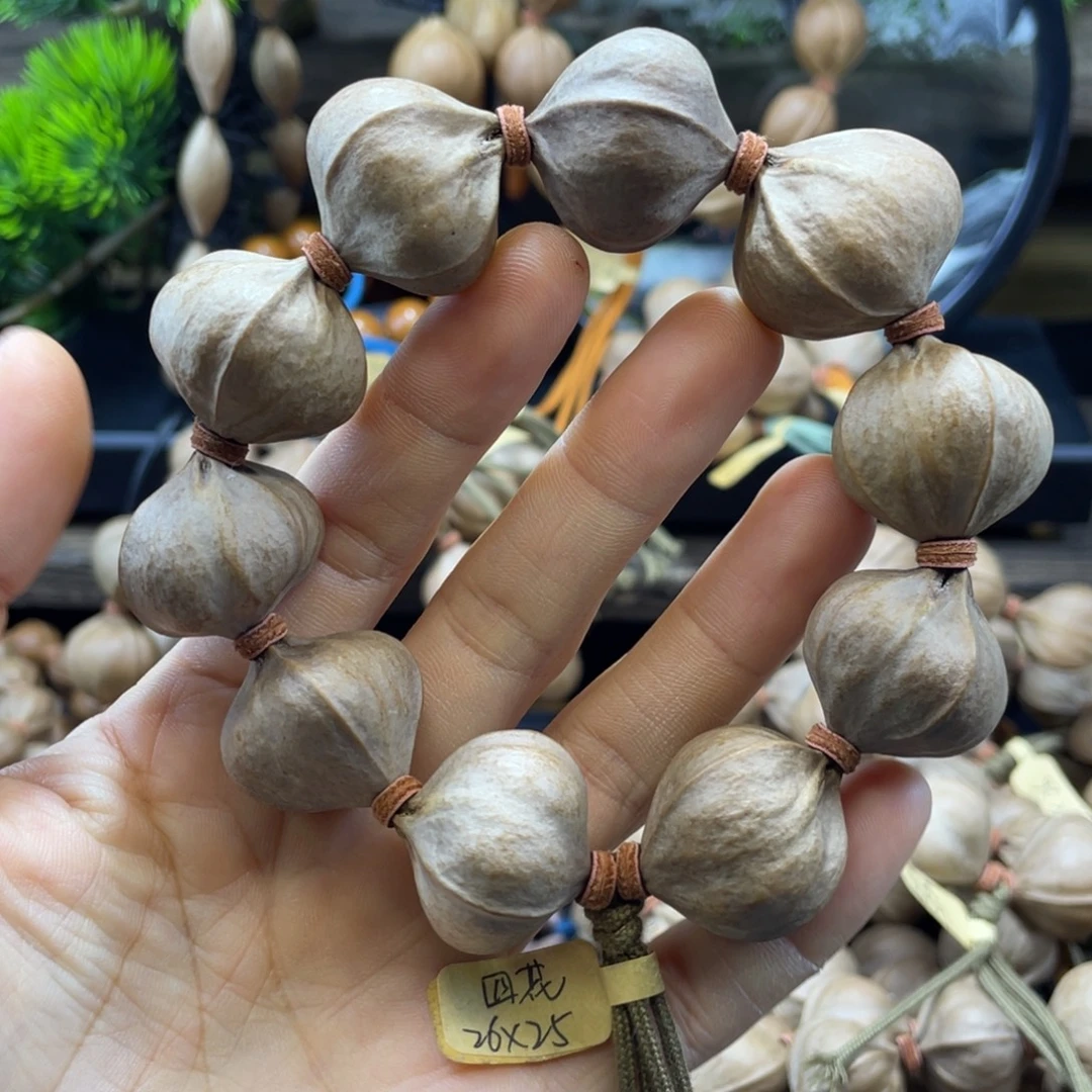 用***8橄榄核吊坠26x25四花
