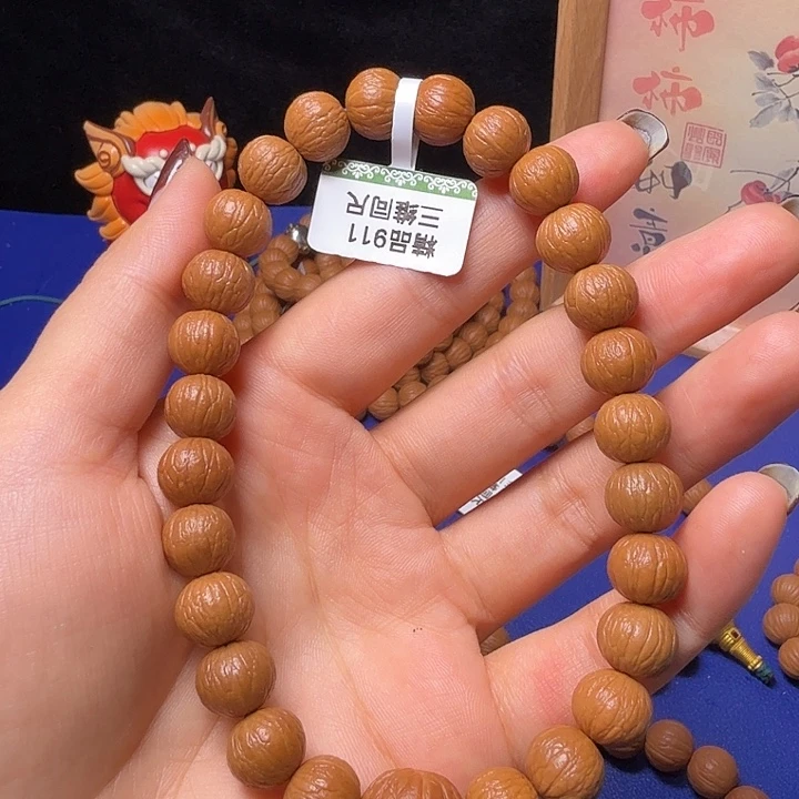 平***乐猴头核桃手串凤羽