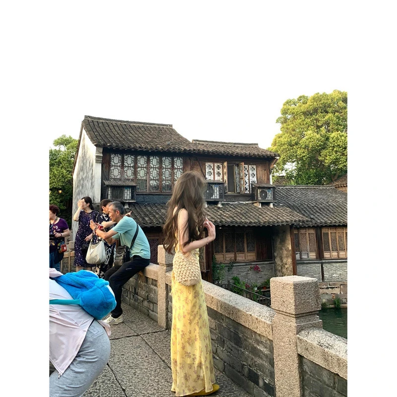 抖音代发雏菊幻境黄色碎花荡领收腰显瘦纯欲吊带长裙2025新款裙子