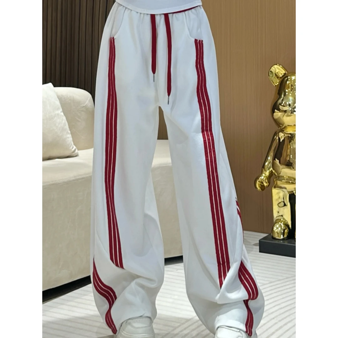 2025秋冬复古三条扛撞色阔腿裤设计感宽松弯刀裤子女休闲运动卫裤