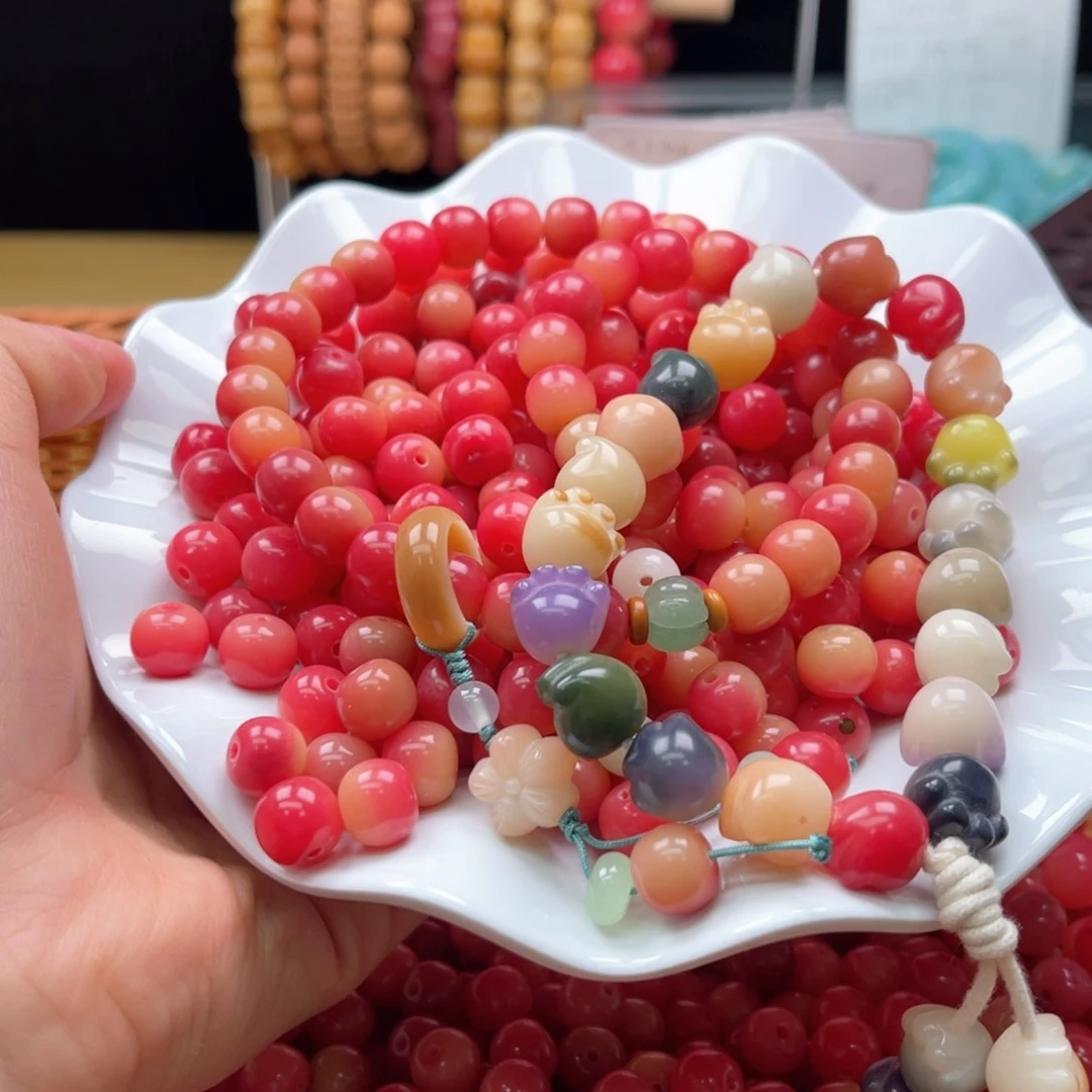 白玉菩提吊坠z10-11mm/150颗混珠+10颗猫爪瑕