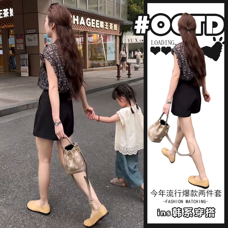 2025年法式洋气无袖印花上衣搭配高腰显腿长阔腿短裤盐系别致套装