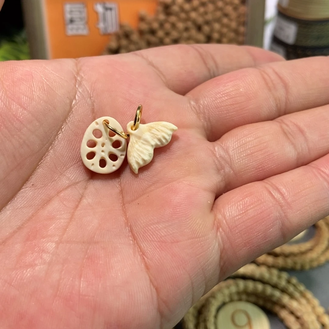 洛***序柏香籽/百香籽吊坠