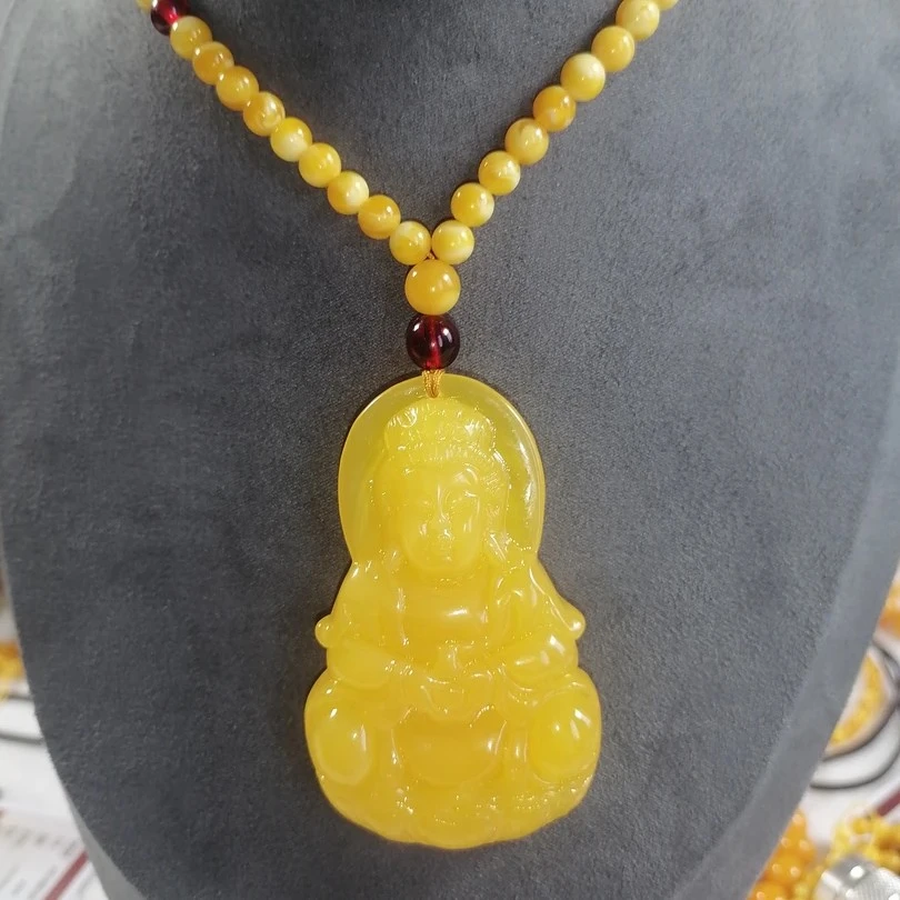 D042鸡油黄重工雕刻观音珠链款