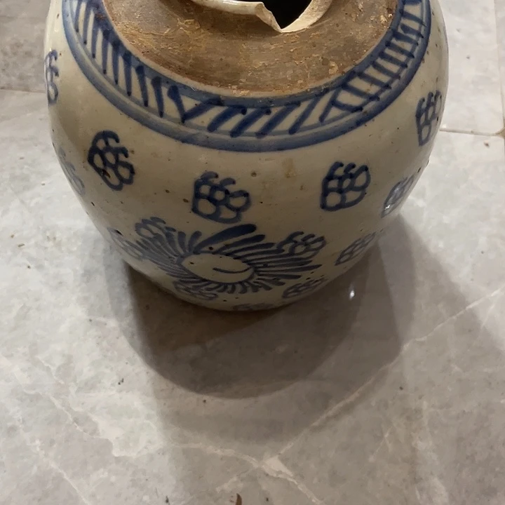 罐長***居青花罐子有残了