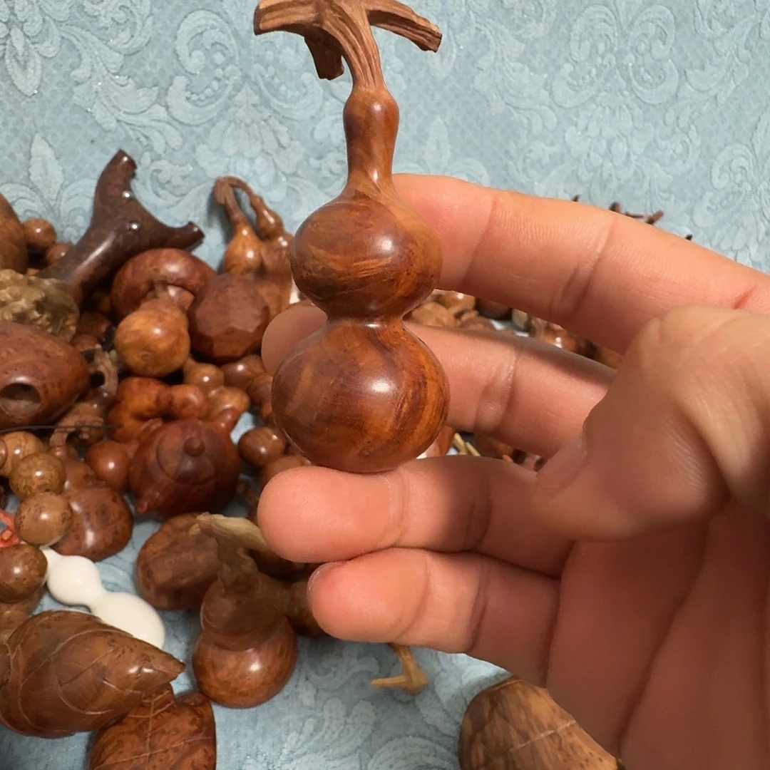 喻***启木麻梨疙瘩葫芦手把件