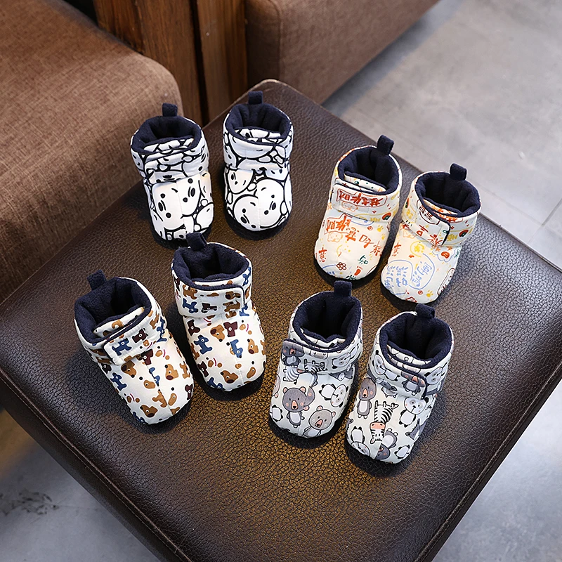 秋冬新生婴儿鞋0-6-12个月男女宝宝卡通加厚鞋袜一体保暖加绒棉鞋