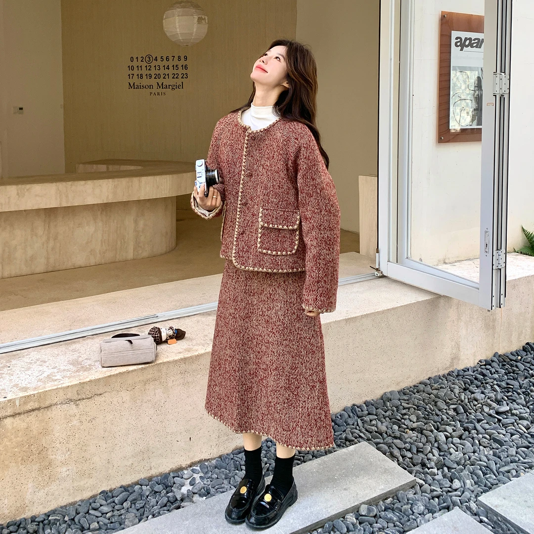 粉色小香风羽绒内衬套装女2025冬季新款名媛气质上衣半身裙两件套