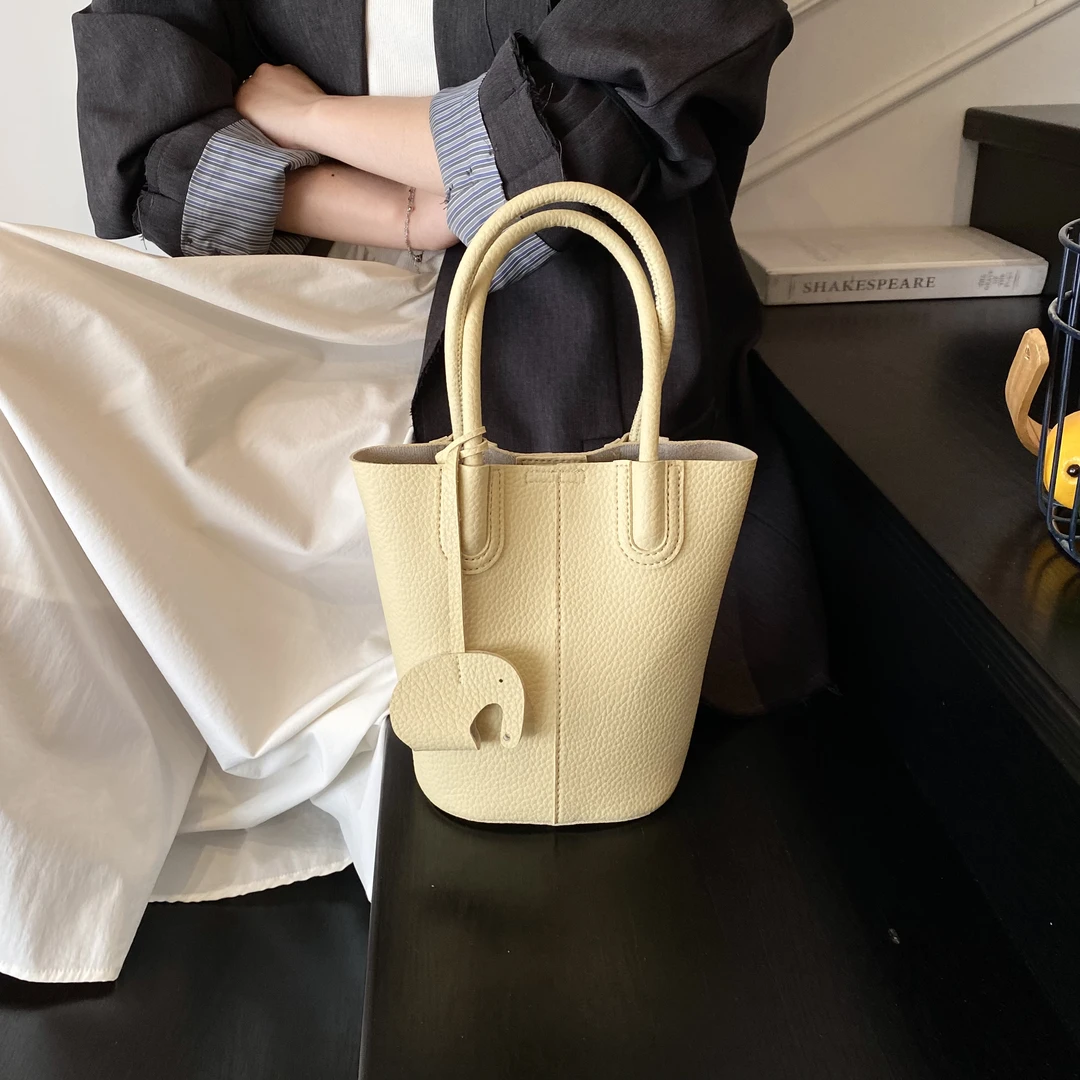 2025新款夏季韩版爆款高级感手提水桶小包包简约百搭单肩斜挎包包