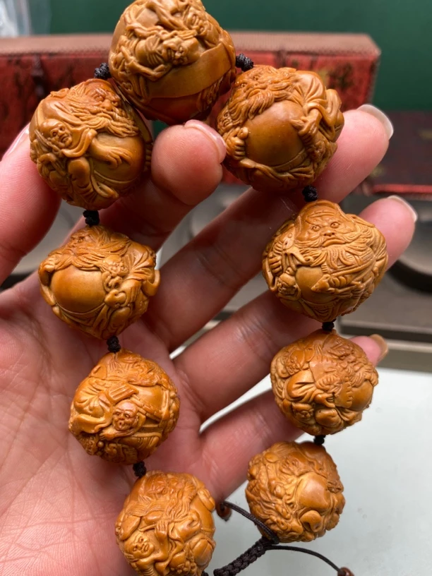 橄榄核雕刻。 橄榄手串