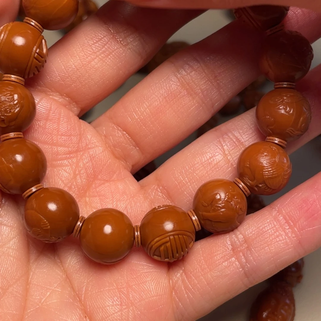 龙***龙琉璃/树脂/塑料类橄榄核1.25尺寸