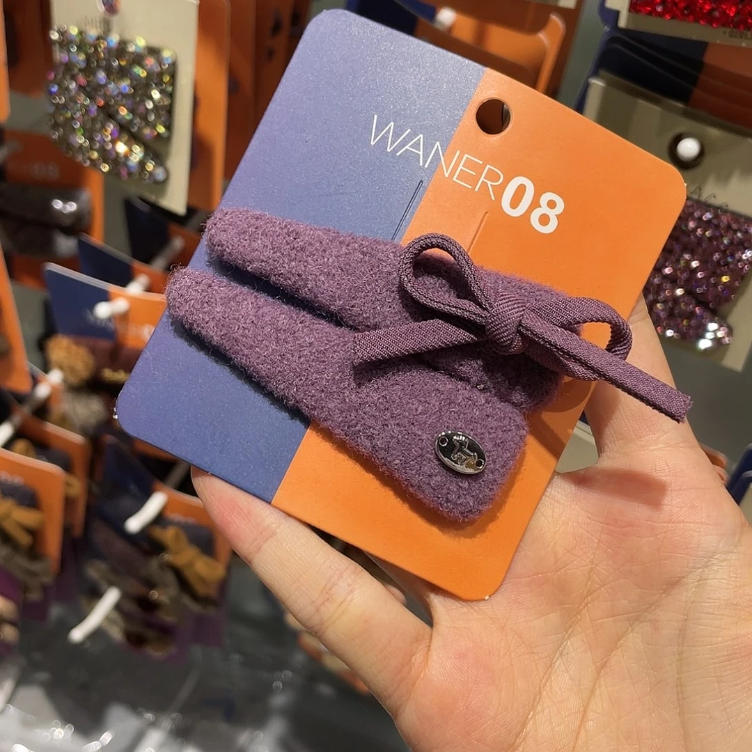 非金属紫色蝴蝶结三角