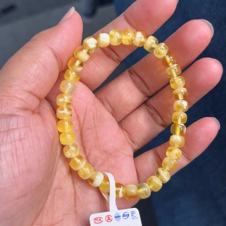 琥珀未镶嵌珠宝奇石M65号6+金瓷白妖花