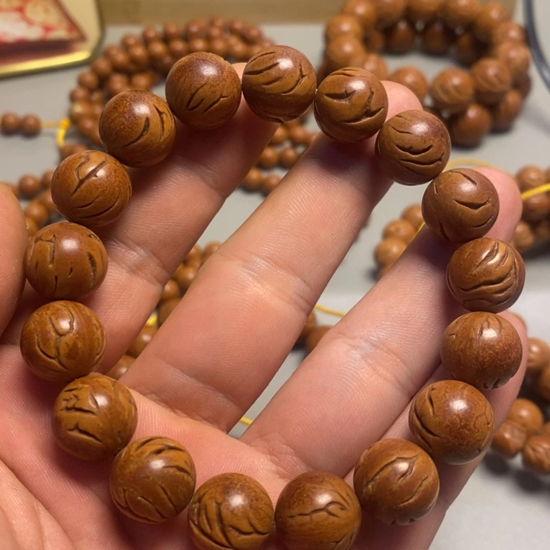手串桃核龙纹光珠13.8