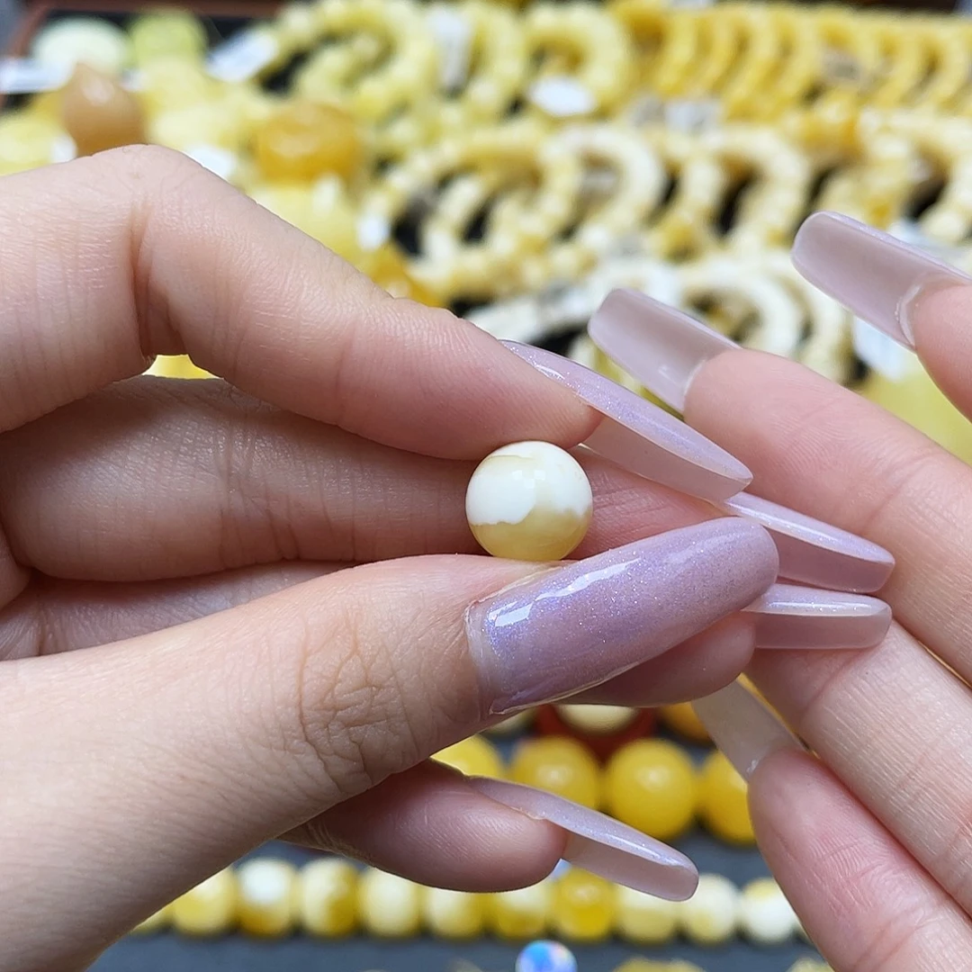 琥珀未镶嵌裸石圆珠10.6mm瑕