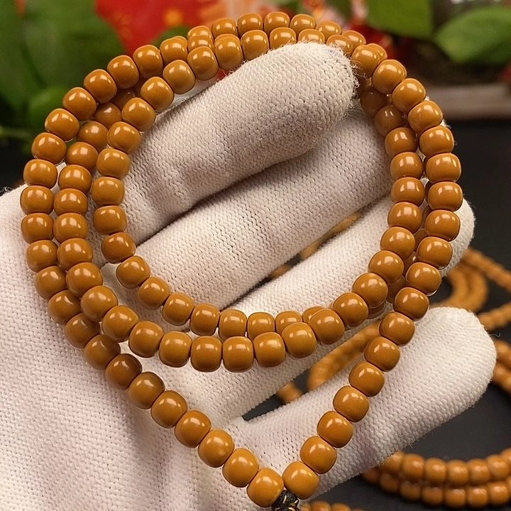 橄榄核手串5.8老挝核尖极限弧108微微白