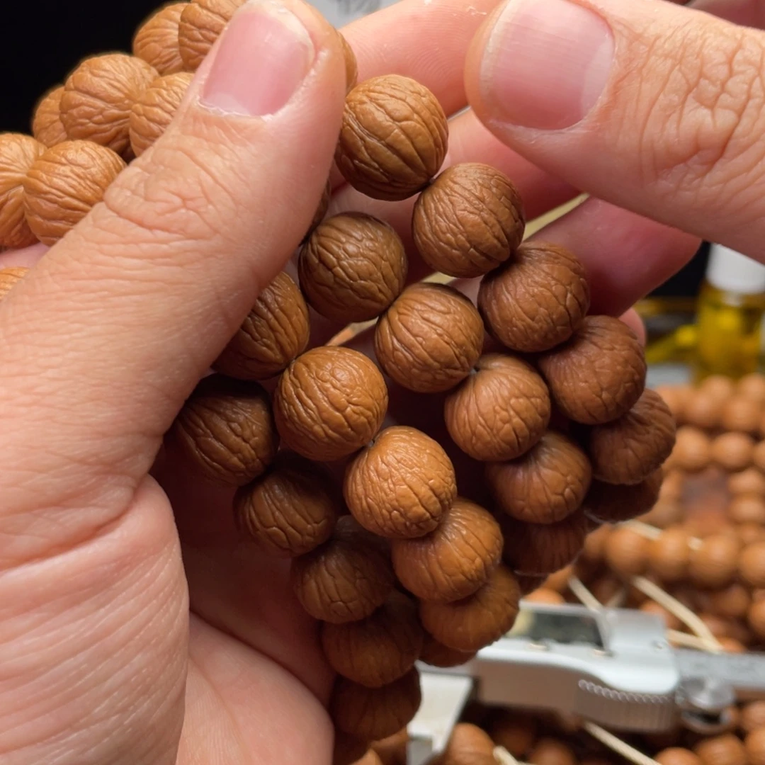 猴头核桃吊坠凤羽