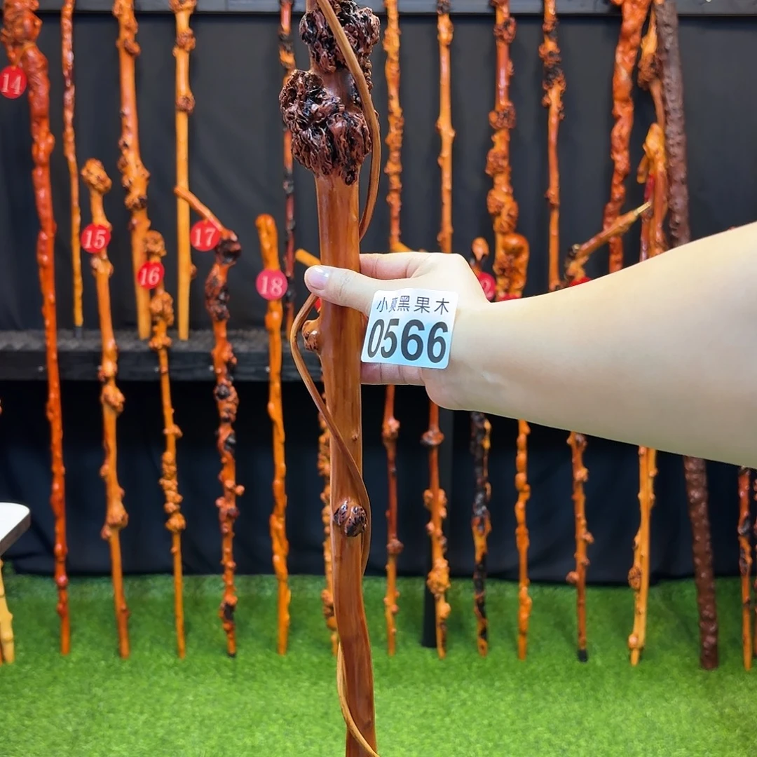 心***损黑果木拐杖手把件566