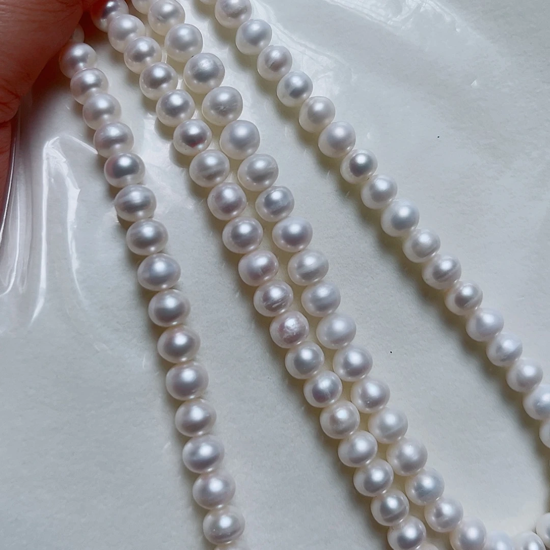 淡水珍珠银S925镶嵌耳饰